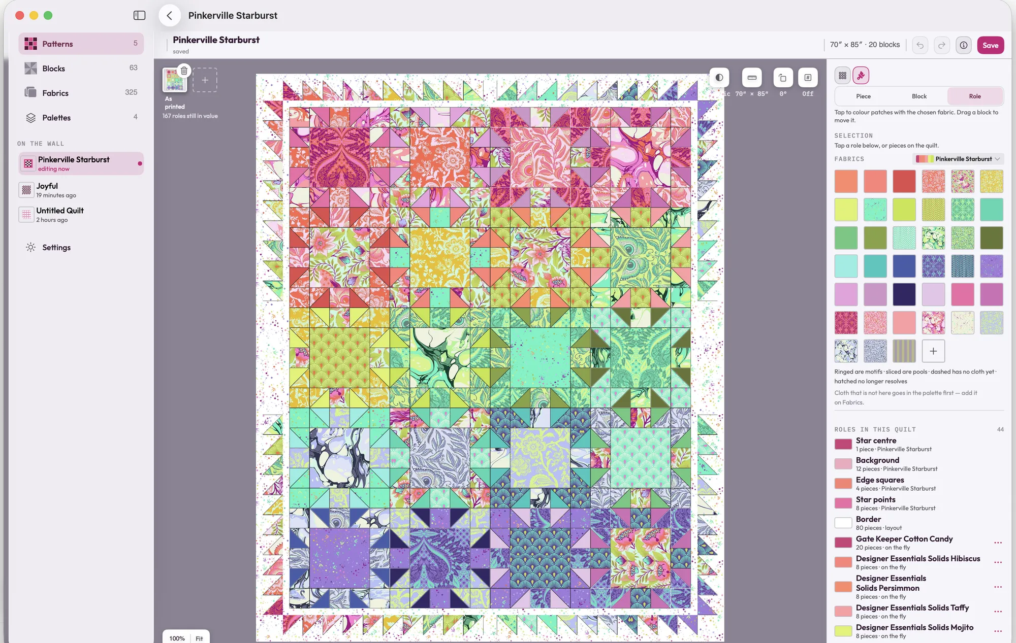 A quilt called Pinkerville Starburst in the Design Wall editor on Mac: twenty star blocks in bright Tula Pink prints and solids inside a sawtooth border, with the quilt's fabrics and roles in the panel beside it.